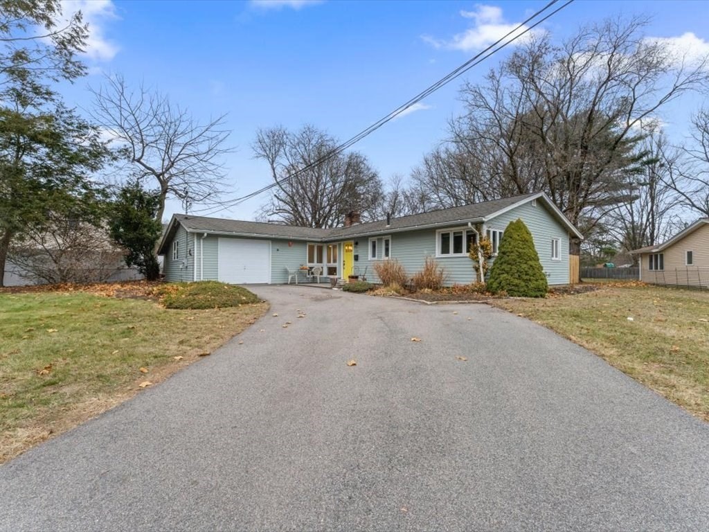 15 Rosslare Road Framingham, MA 01701 - Photo 1 of 37 a front view of house with yard and trees