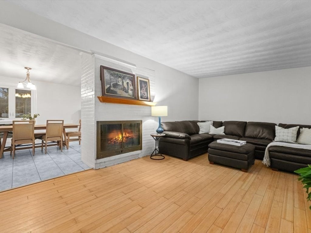 15 Rosslare Road Framingham, MA 01701 - Photo 14 of 37 a living room with furniture and a fireplace