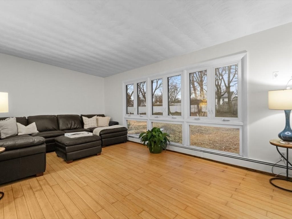 15 Rosslare Road Framingham, MA 01701 - Photo 16 of 37 a living room with furniture and a large window