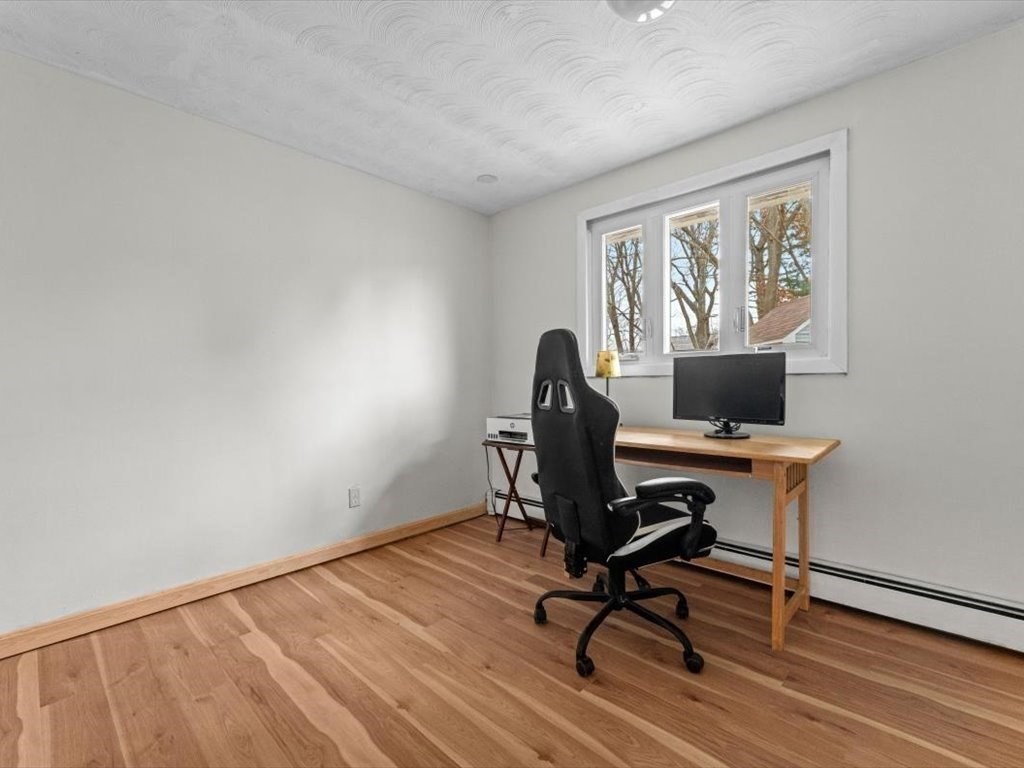 15 Rosslare Road Framingham, MA 01701 - Photo 26 of 37 a view of workspace with wooden floor windows