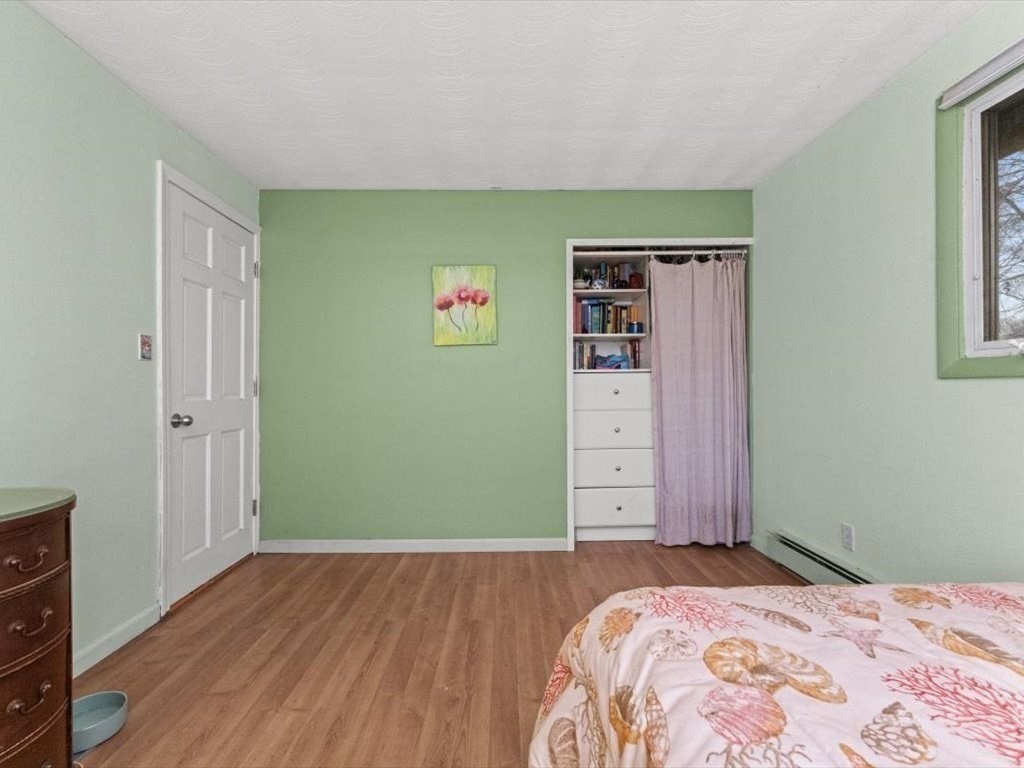 15 Rosslare Road Framingham, MA 01701 - Photo 28 of 37 a bedroom with a bed and a window
