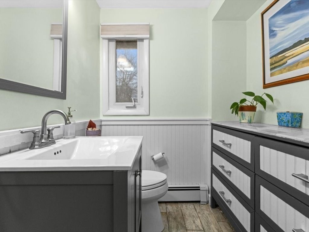 15 Rosslare Road Framingham, MA 01701 - Photo 31 of 37 a bathroom with a sink a toilet and a window