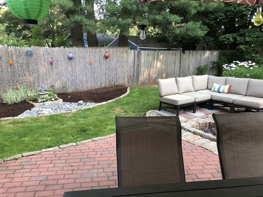 15 Rosslare Road Framingham, MA 01701 - Photo 36 of 37 a backyard of a house with lots of green space