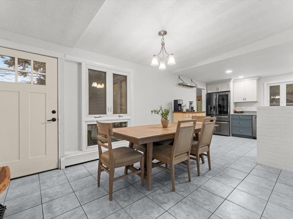 15 Rosslare Road Framingham, MA 01701 - Photo 6 of 37 a view of a dining room with furniture