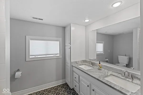 $825,000 | 5715 Winterwind Lane, Indianapolis, IN 46237