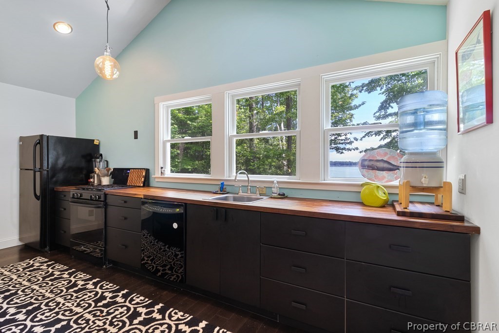 90 Bar Point Road Lancaster, VA 22503 - Photo 5 of 33 a kitchen with a sink and a window