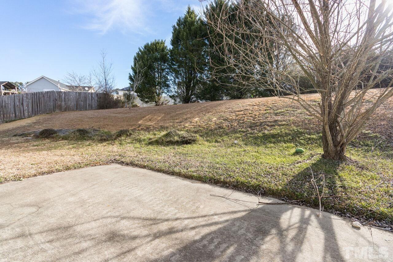 6122 Ricker Road Raleigh, NC 27610 - Photo 18 of 20 a view of a yard