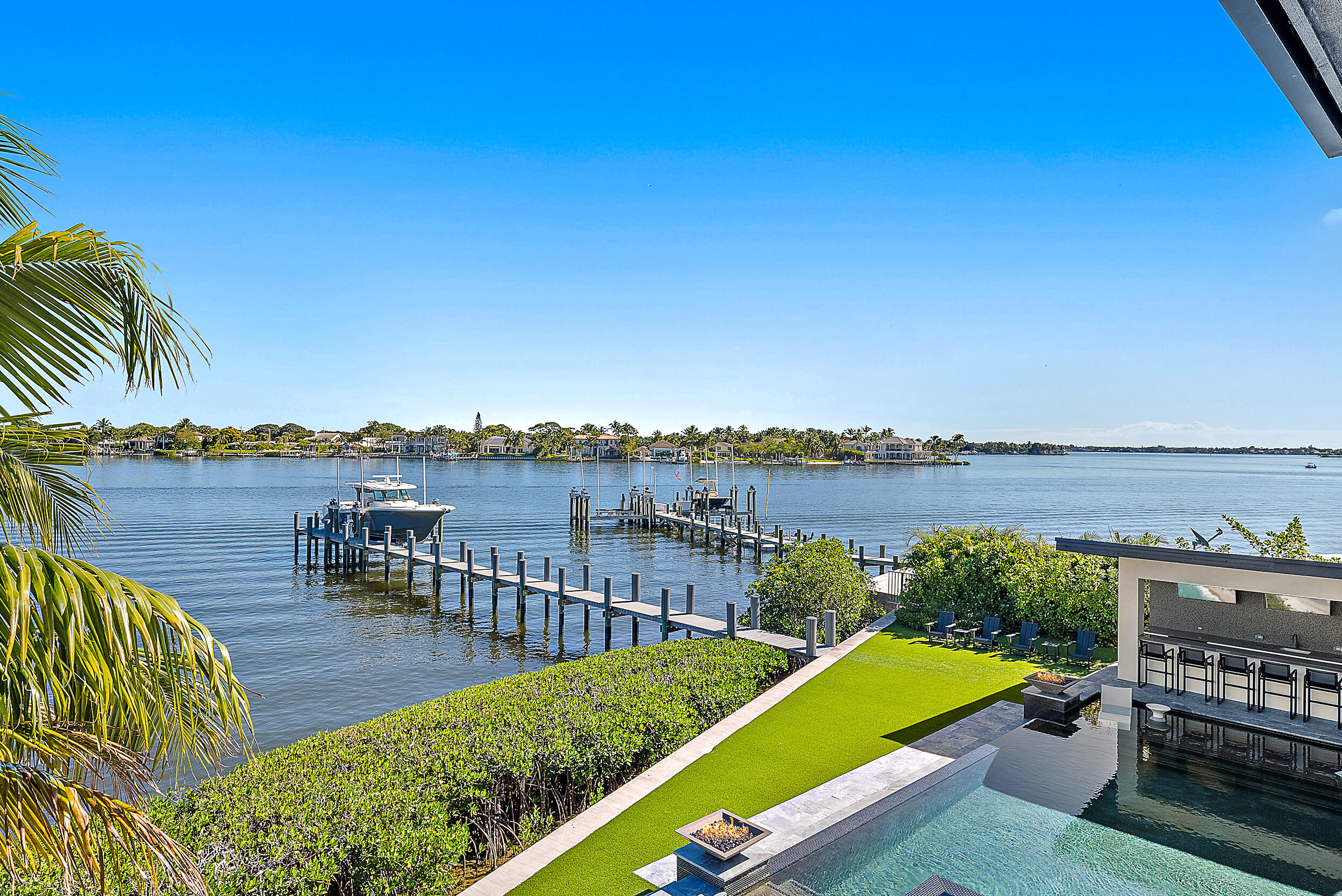 9 Bamboo Lane Jupiter, FL 33458 - Photo 32 of 46 Covered Balcony View Backyard