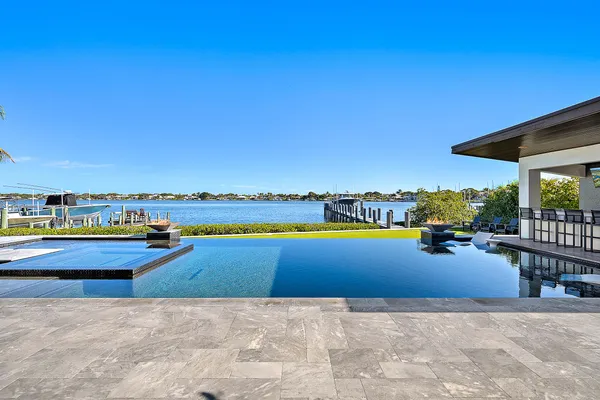 a view of a swimming pool and deck