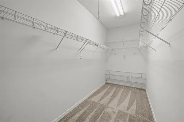 a view of a room with racks on the wall