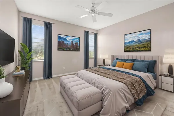 a bedroom with a balcony a large bed and a flat screen tv