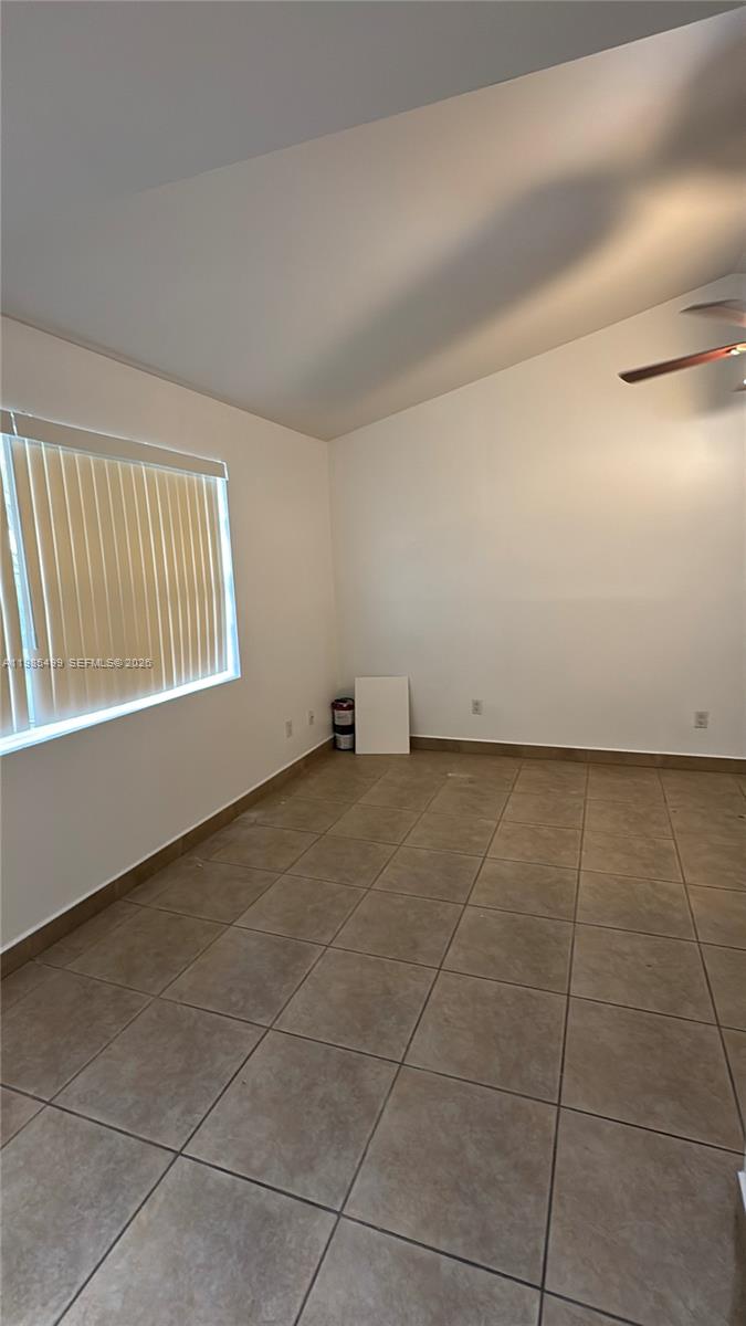 15320 Southwest 106th Terrace, Unit 1118 Miami, FL 33196 - Photo 11 of 25 a view of an empty room and window