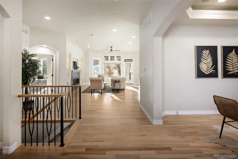 a view of a hallway with seating area