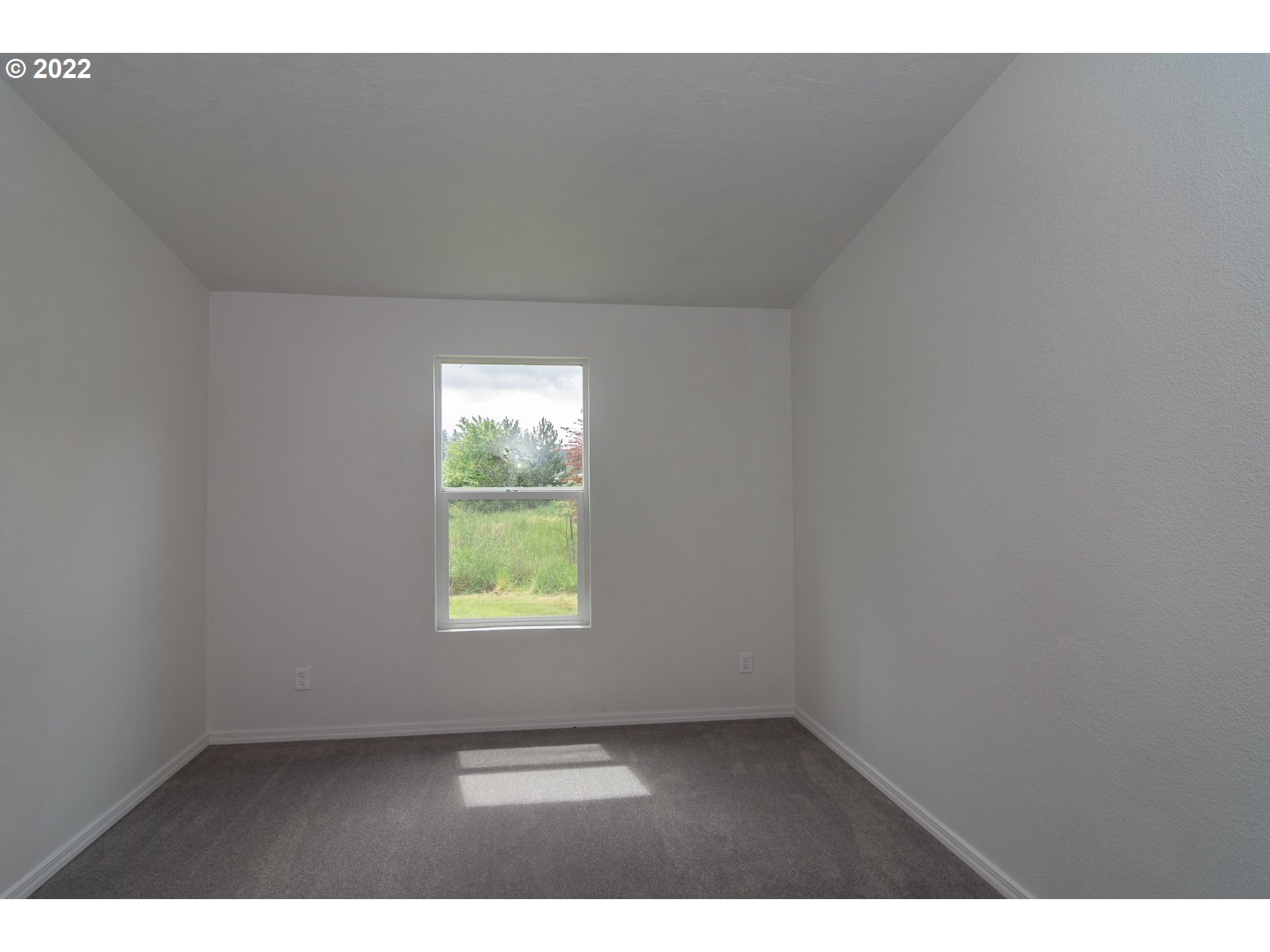 692 Mathis Hill Road Yoncalla, OR 97499 - Photo 23 of 31 a view of an empty room with a window