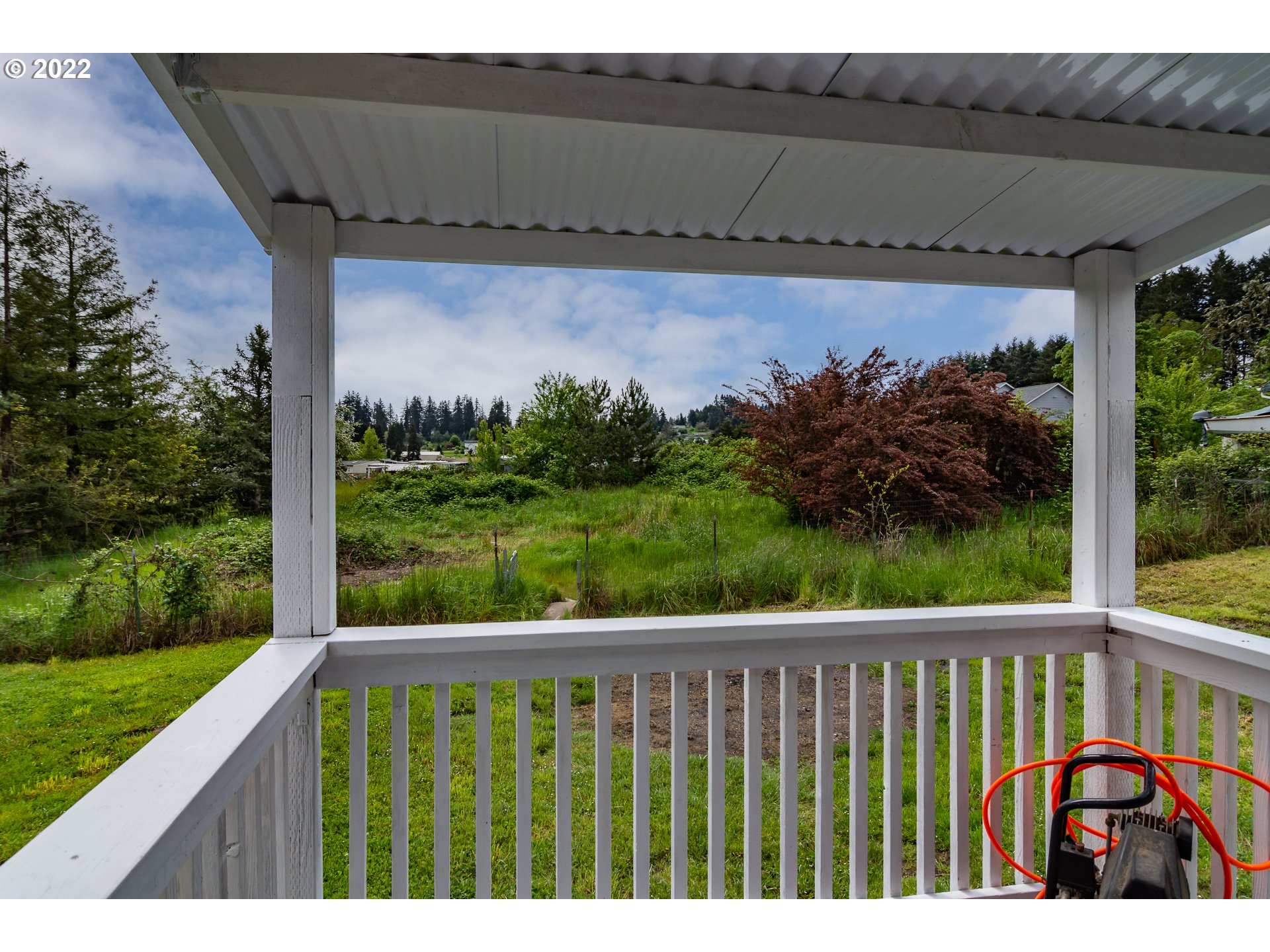 692 Mathis Hill Road Yoncalla, OR 97499 - Photo 27 of 31 a view of a back yard from a balcony