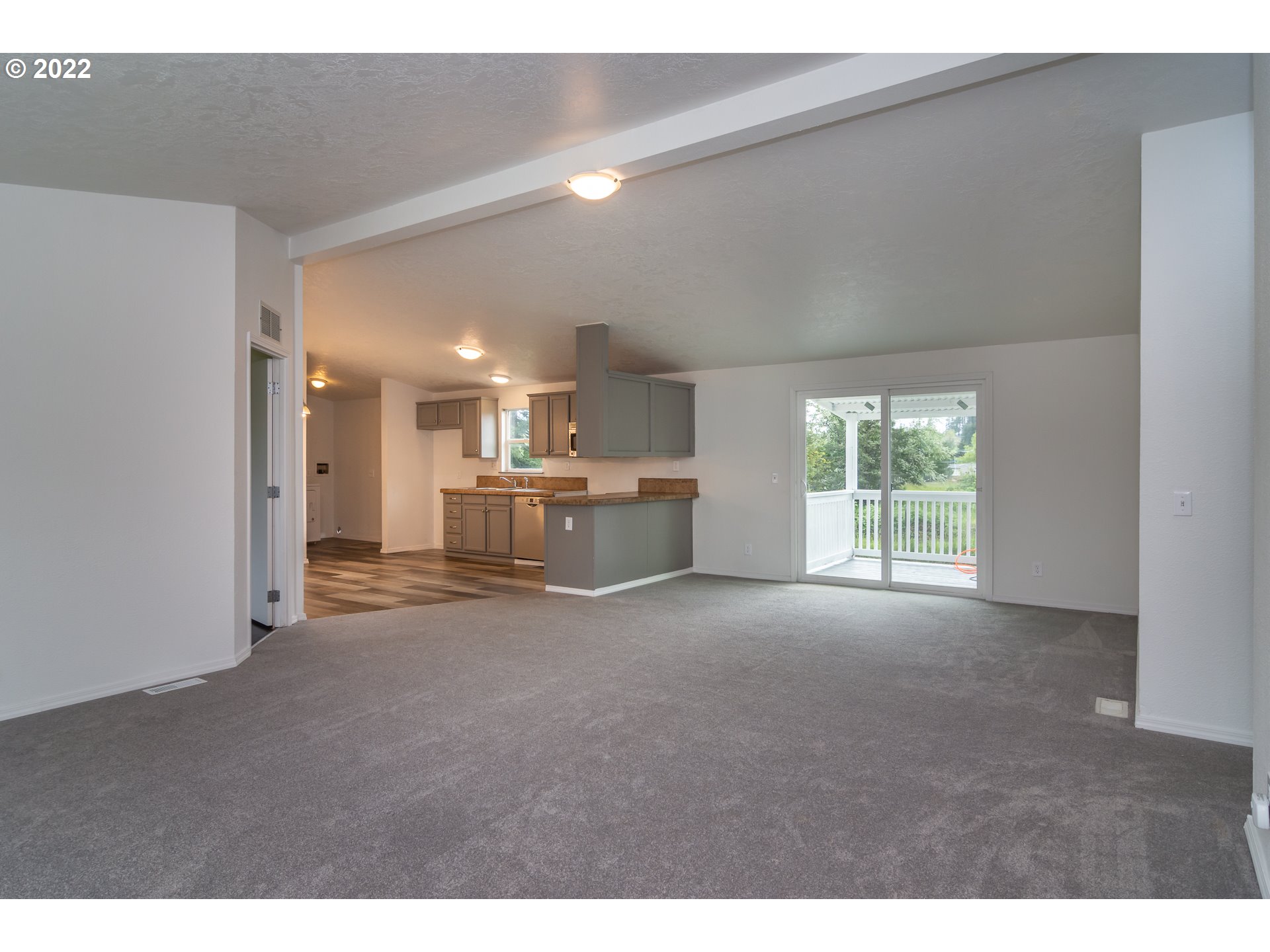 692 Mathis Hill Road Yoncalla, OR 97499 - Photo 3 of 31 a view of a kitchen with a sink and a window