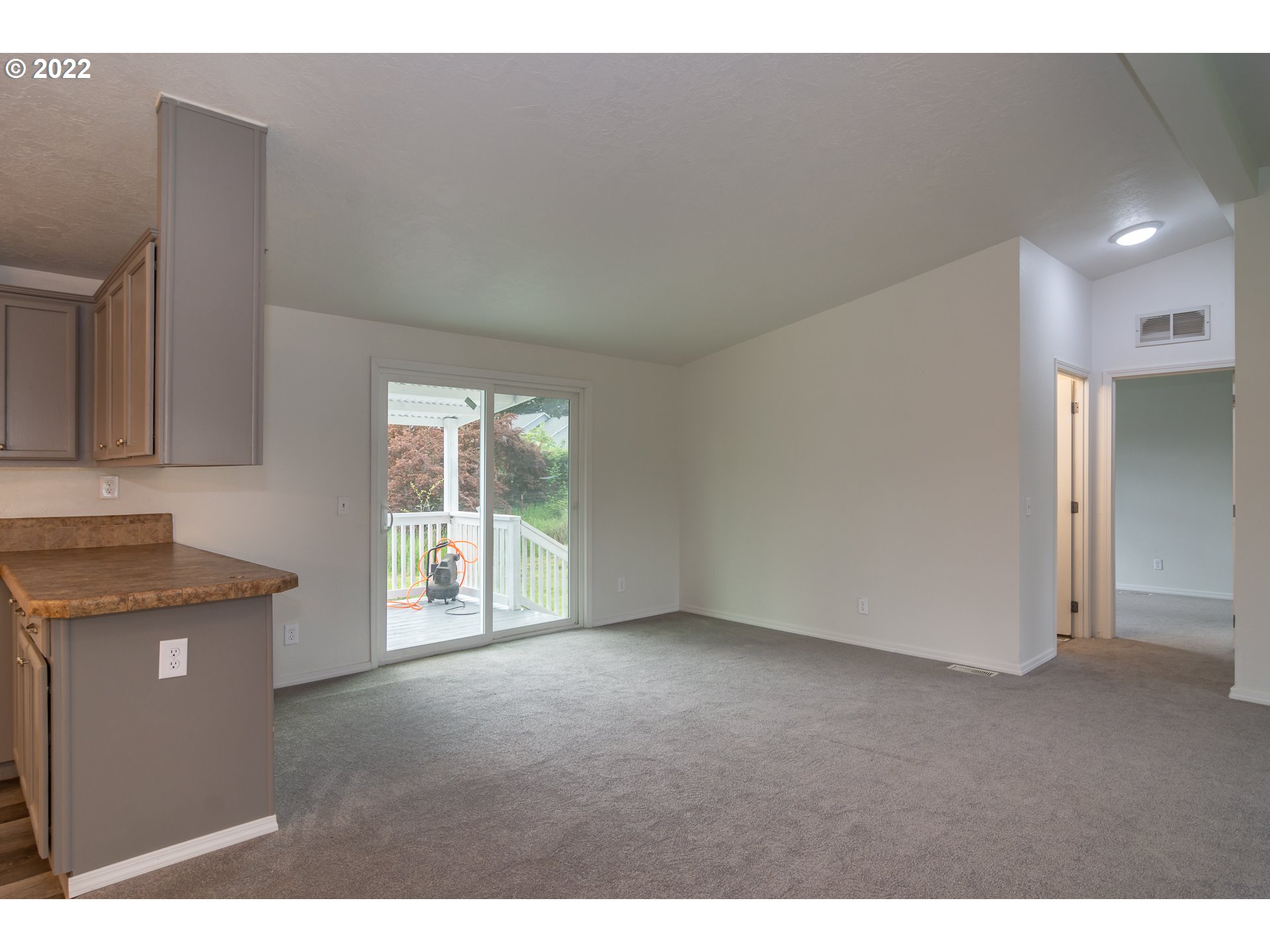 692 Mathis Hill Road Yoncalla, OR 97499 - Photo 4 of 31 a view of an empty room with a window