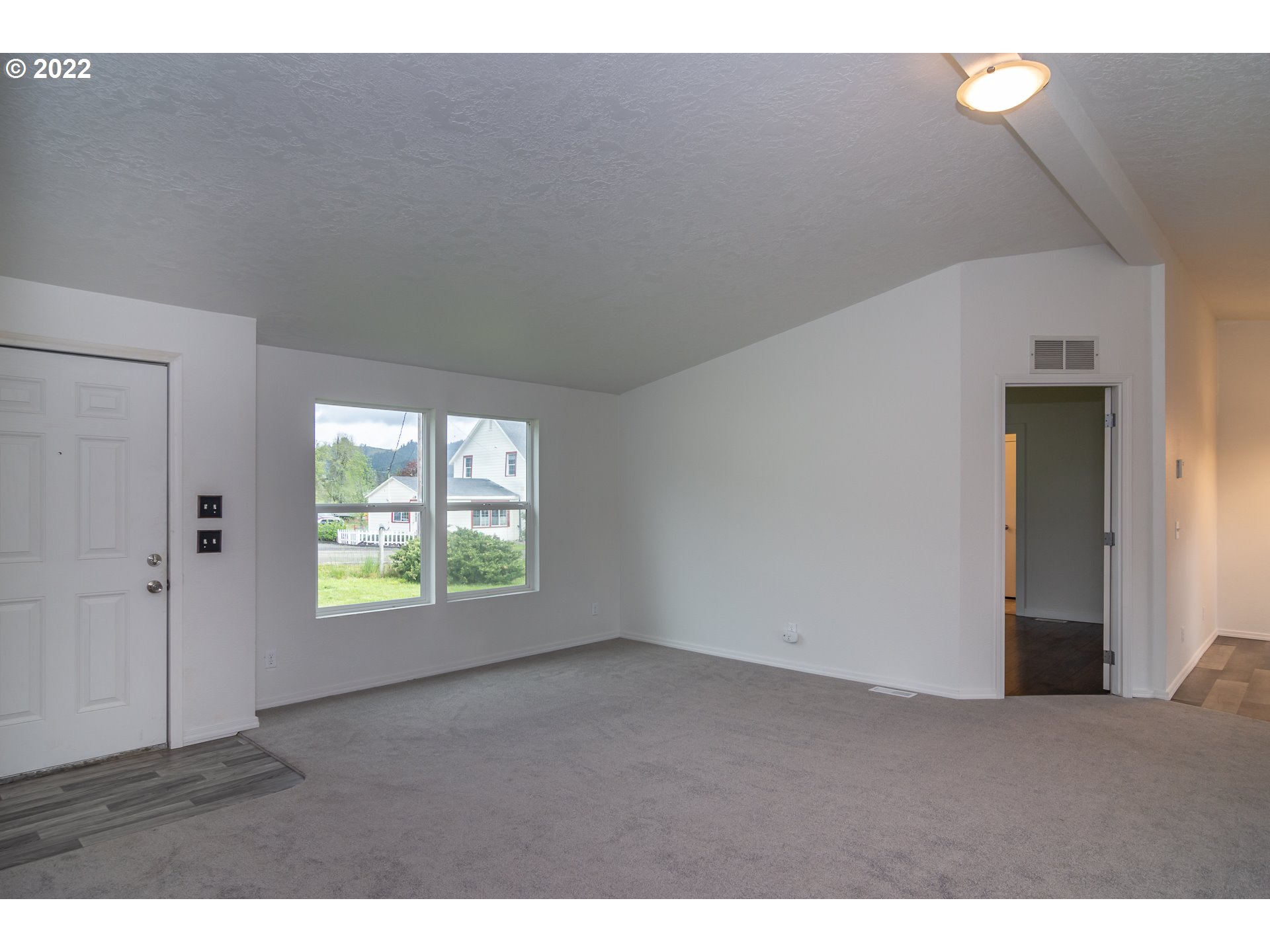 692 Mathis Hill Road Yoncalla, OR 97499 - Photo 7 of 31 a view of an empty room with a window
