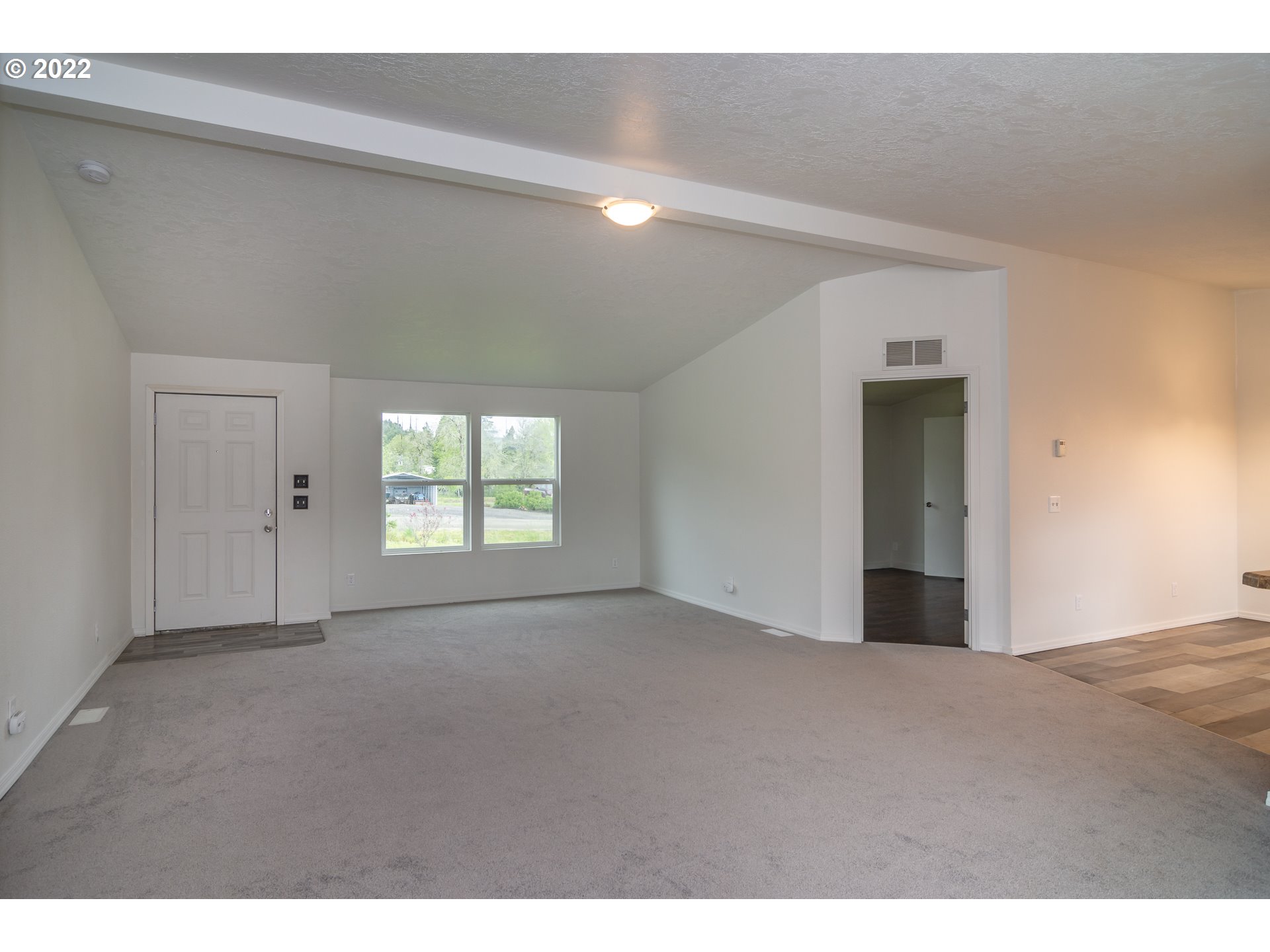 692 Mathis Hill Road Yoncalla, OR 97499 - Photo 9 of 31 a view of an empty room with a window