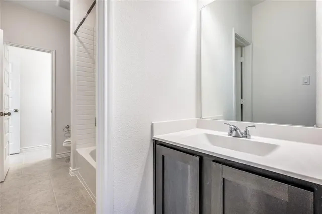 a view of a house with a snow in a yard