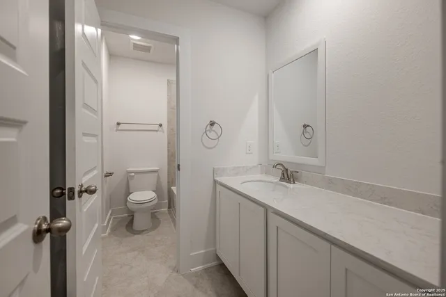 a view of kitchen and hallway