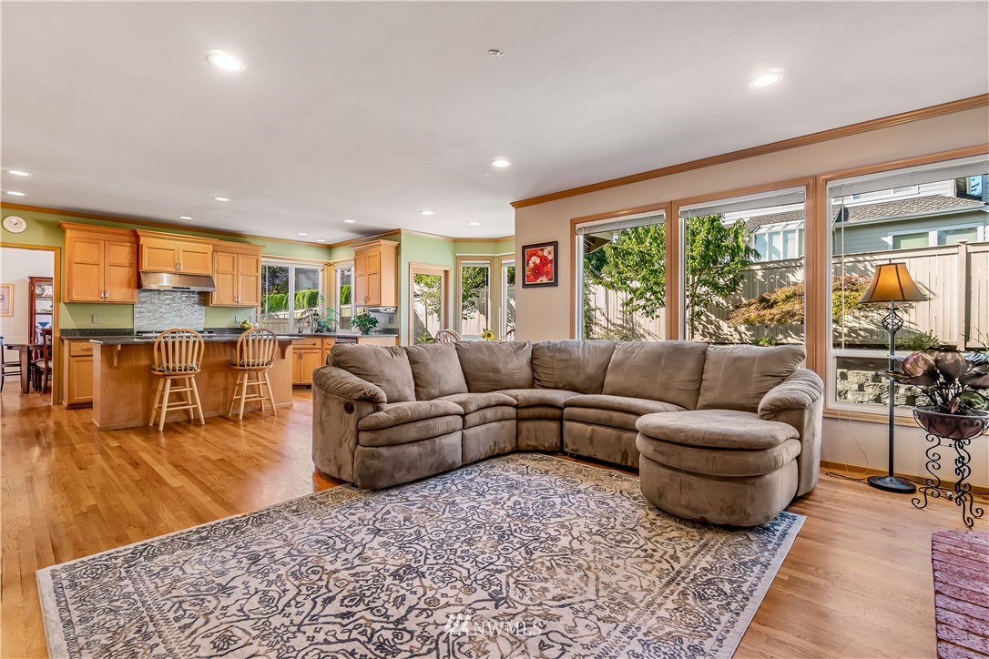 3009 214th Street Southeast Bothell, WA 98021 - Photo 20 of 36 a living room with furniture and a large window