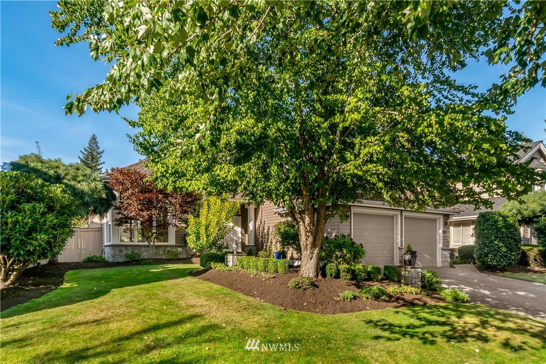 3009 214th Street Southeast Bothell, WA 98021 - Photo 3 of 36 front view of a house with a yard