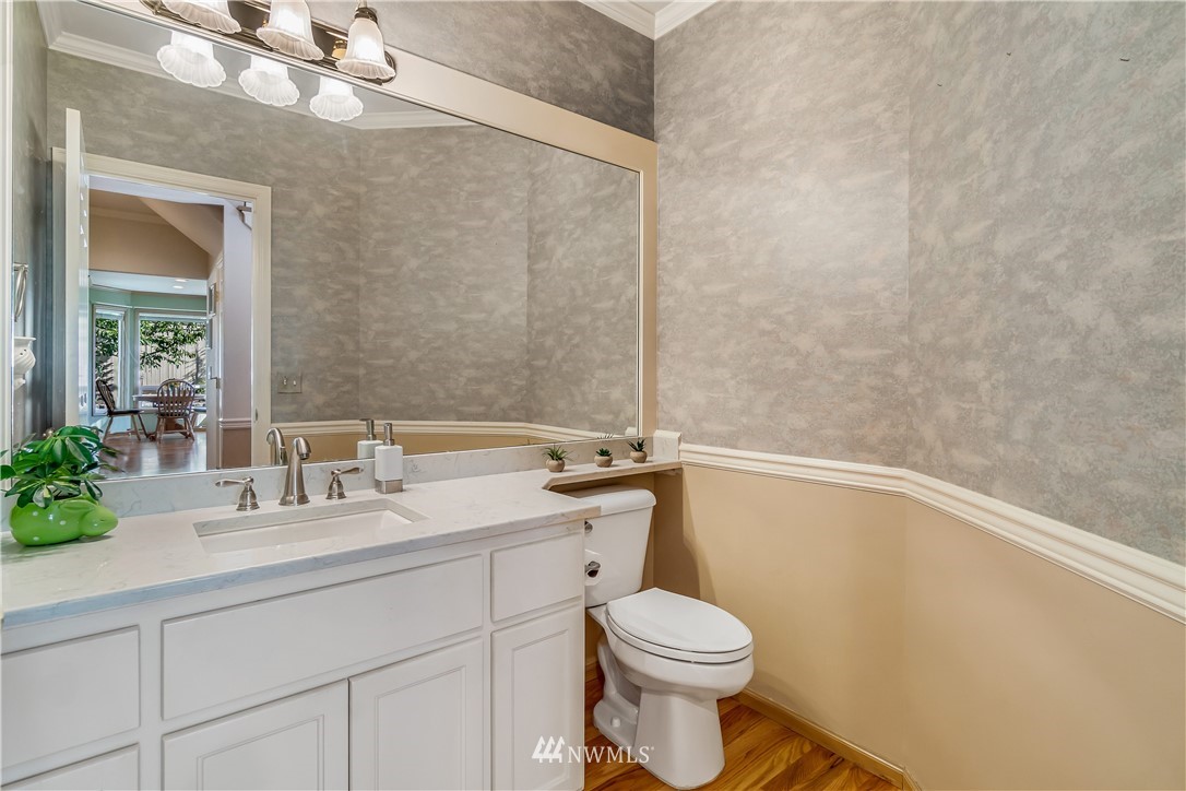 3009 214th Street Southeast Bothell, WA 98021 - Photo 22 of 36 a bathroom with a sink a toilet and shower
