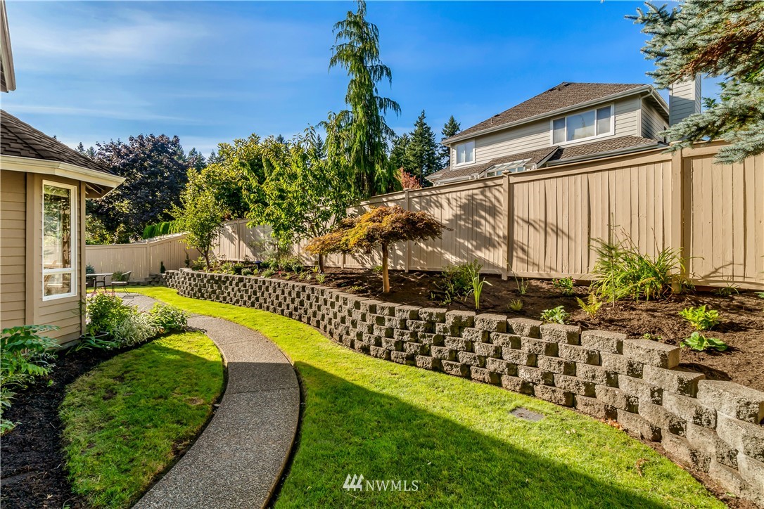 3009 214th Street Southeast Bothell, WA 98021 - Photo 32 of 36 a view of a house with a yard