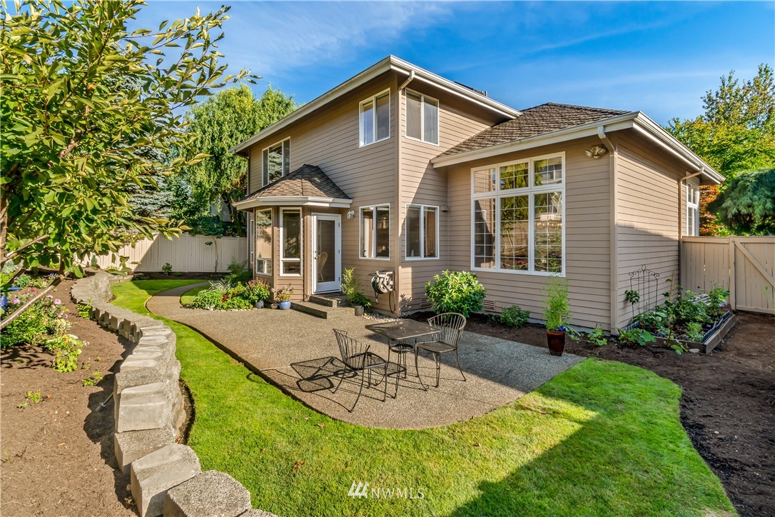 3009 214th Street Southeast Bothell, WA 98021 - Photo 35 of 36 a view of a house with backyard and sitting area