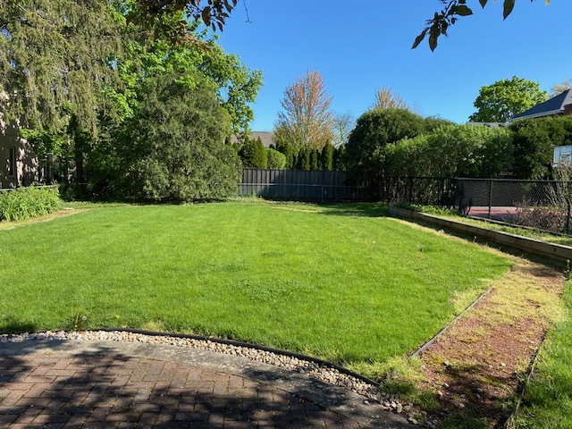 812 Elm Street Park Ridge, IL 60068 - Photo 22 of 22 a view of a backyard with a garden