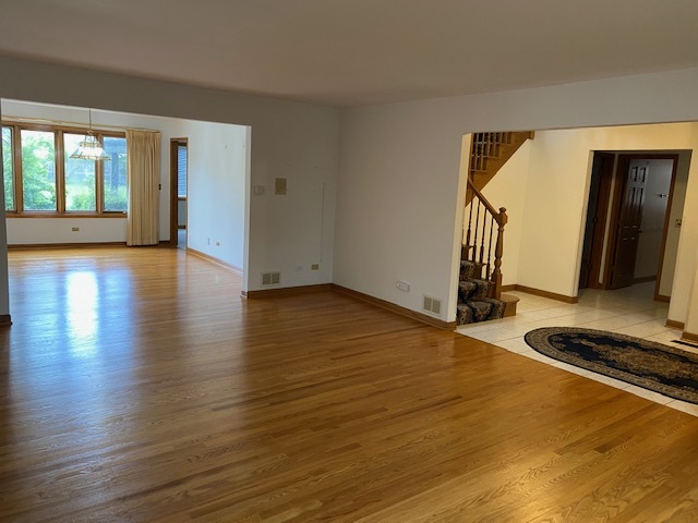 812 Elm Street Park Ridge, IL 60068 - Photo 6 of 22 a room with wooden floor and furniture