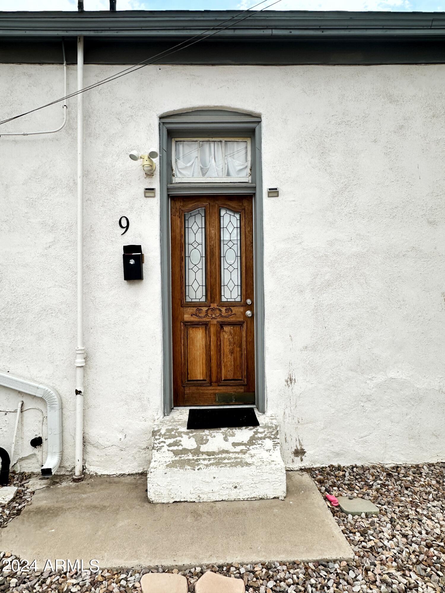1019 West Woodland Avenue, Unit 9 Phoenix, AZ 85007 - Photo 2 of 6 a view of a wooden door