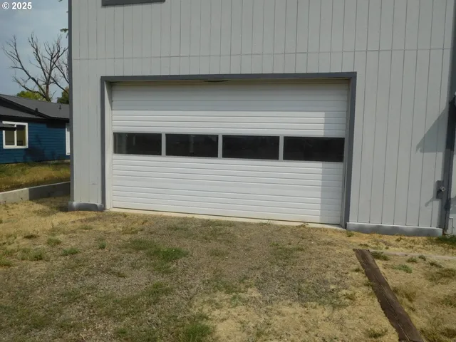 a house with trees in the background
