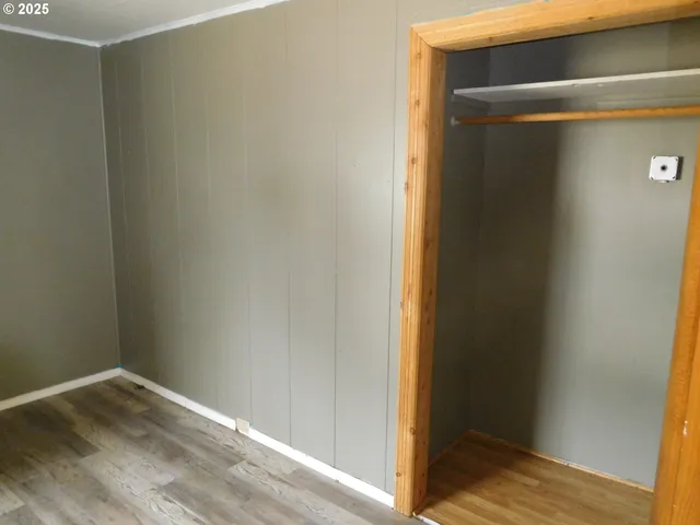 a kitchen with a sink a stove and cabinets