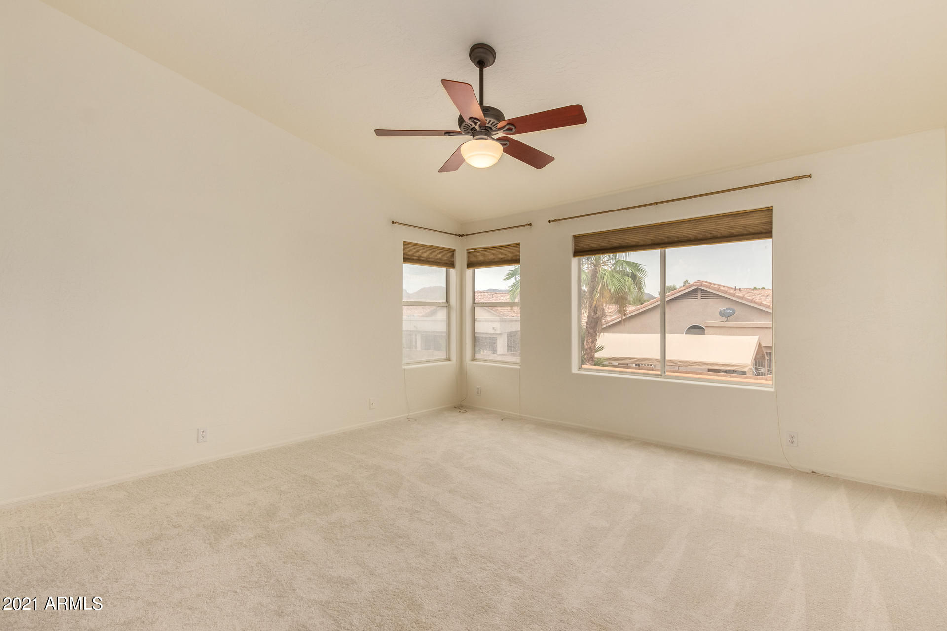 4244 East Raven Road Phoenix, AZ 85044 - Photo 16 of 31 a view of an empty room with a window