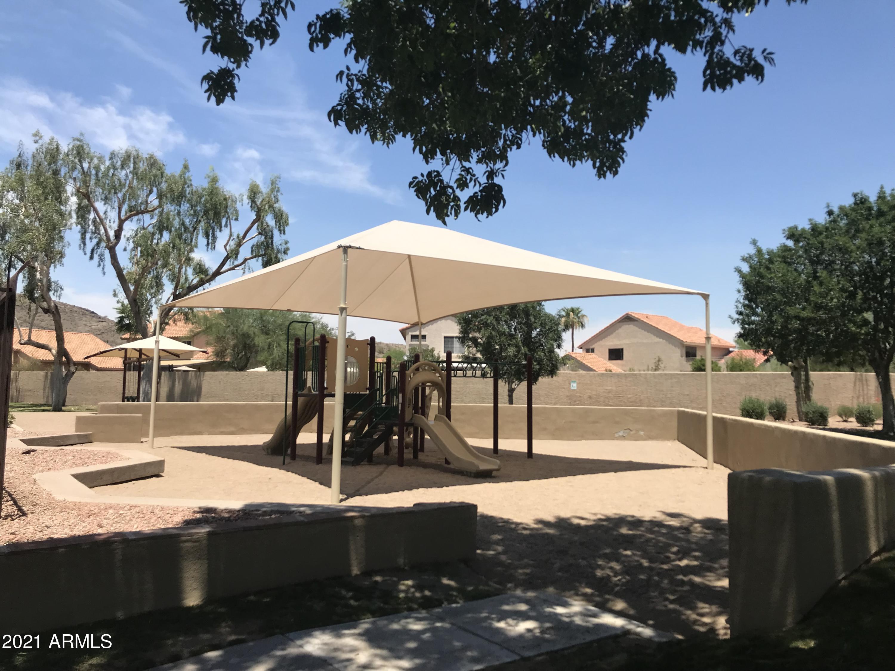 4244 East Raven Road Phoenix, AZ 85044 - Photo 30 of 31 a view of outdoor space with seating