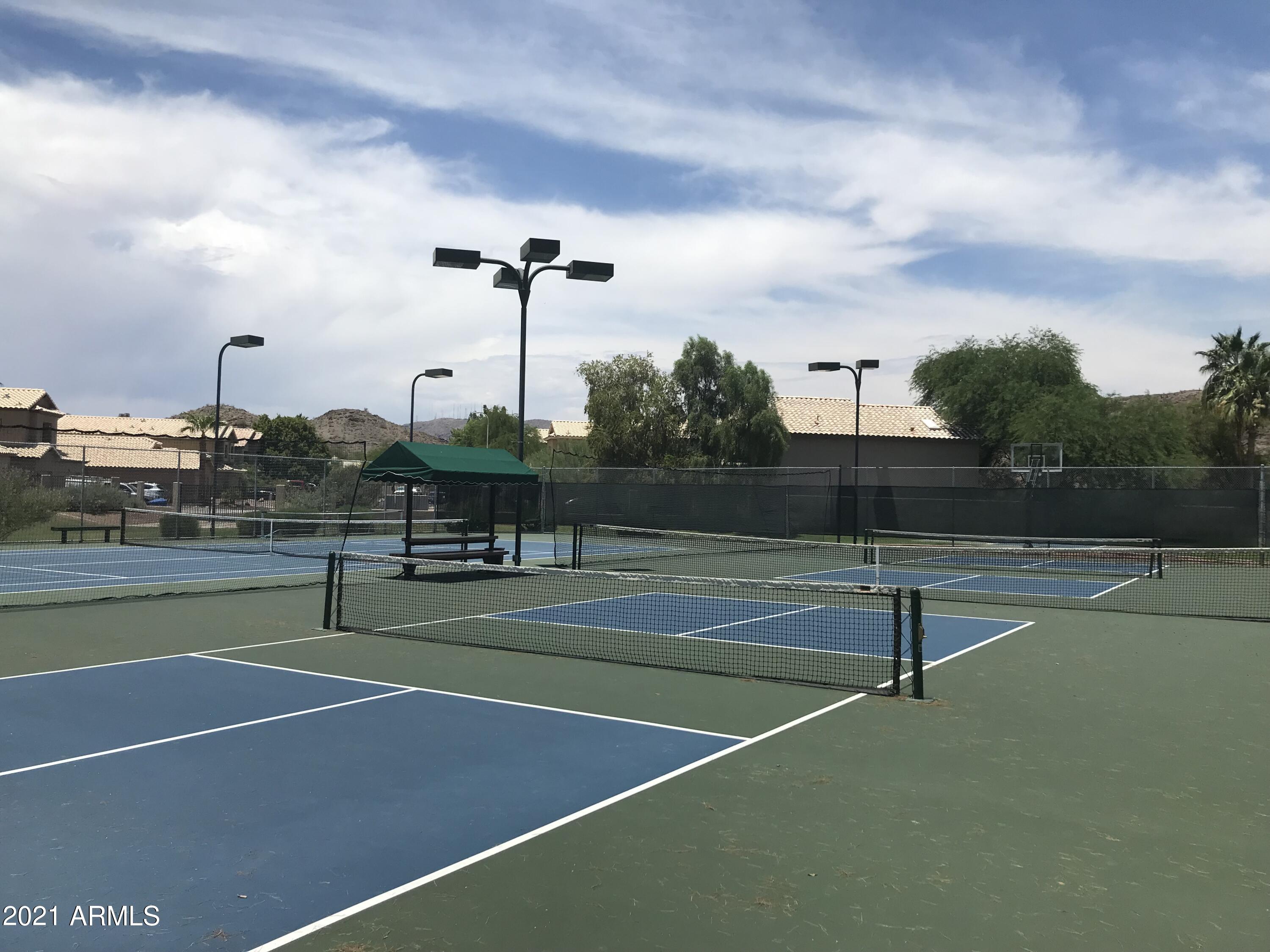 4244 East Raven Road Phoenix, AZ 85044 - Photo 31 of 31 a view of a tennis court