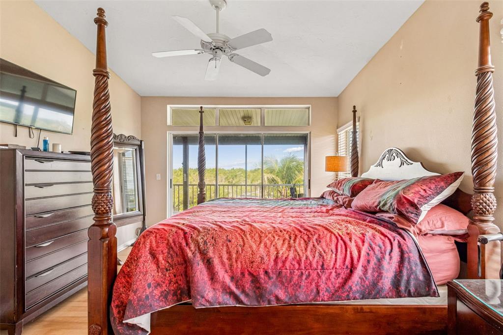119 Burns Road Terra Ceia, FL 34250 - Photo 39 of 100 a bedroom with a bed and window
