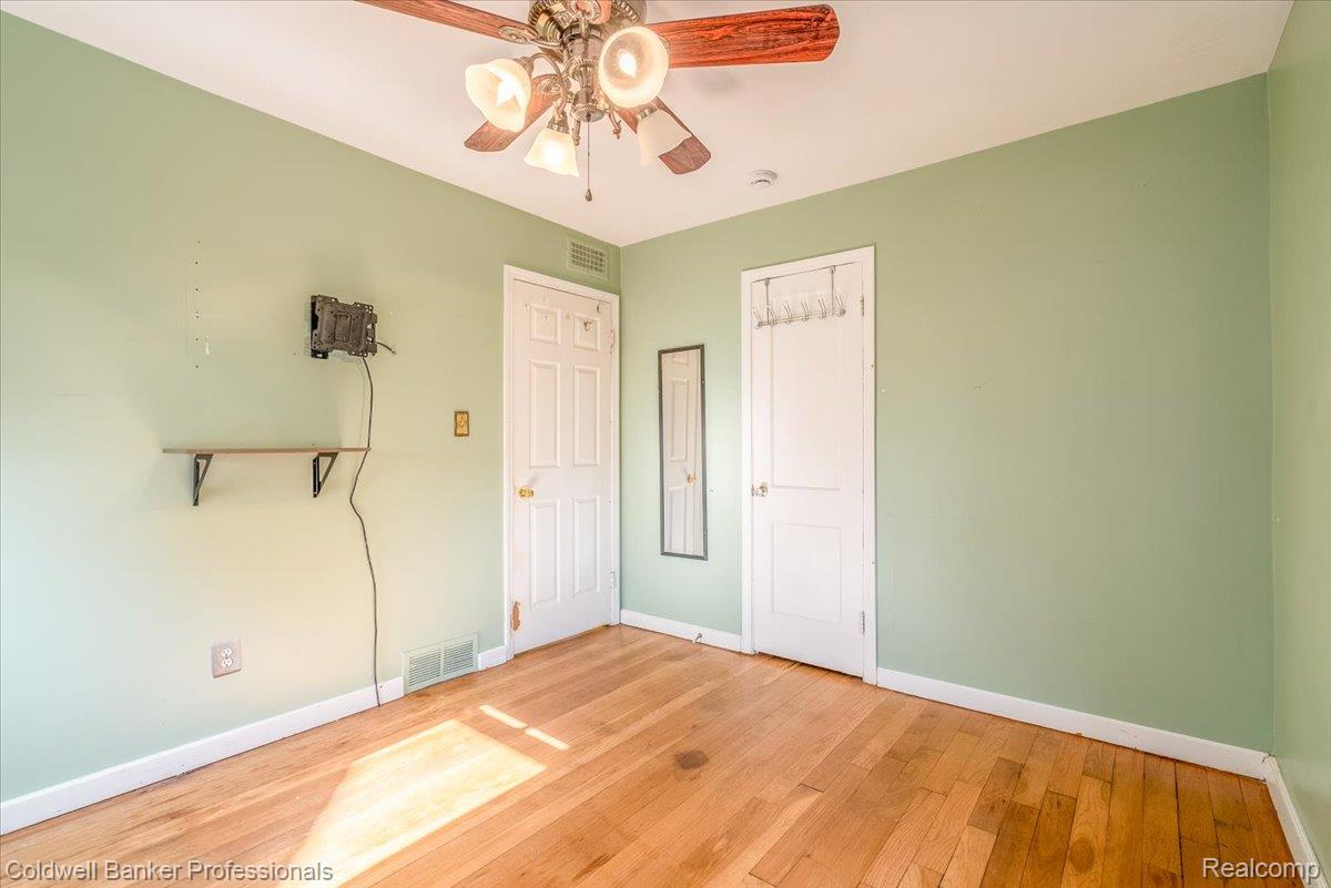 3582 Swanson Street Wayne, MI 48184 - Photo 14 of 30 Unfurnished bedroom featuring wood finished floors and ceiling fan