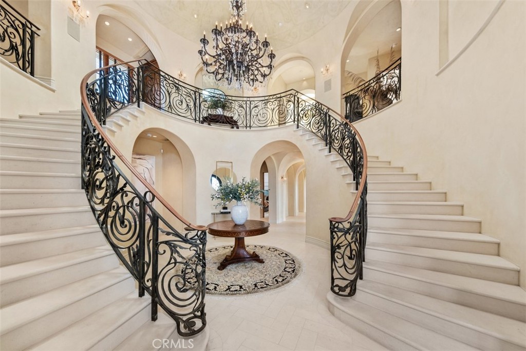32040 Cape Point Drive Rancho Palos Verdes, CA 90275 - Photo 11 of 70 a view of entryway with a table and a chandelier