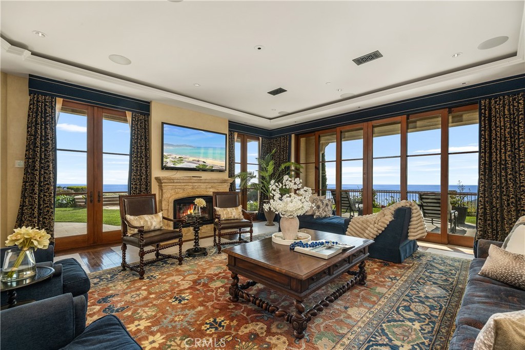 32040 Cape Point Drive Rancho Palos Verdes, CA 90275 - Photo 29 of 70 a living room with furniture and a large window