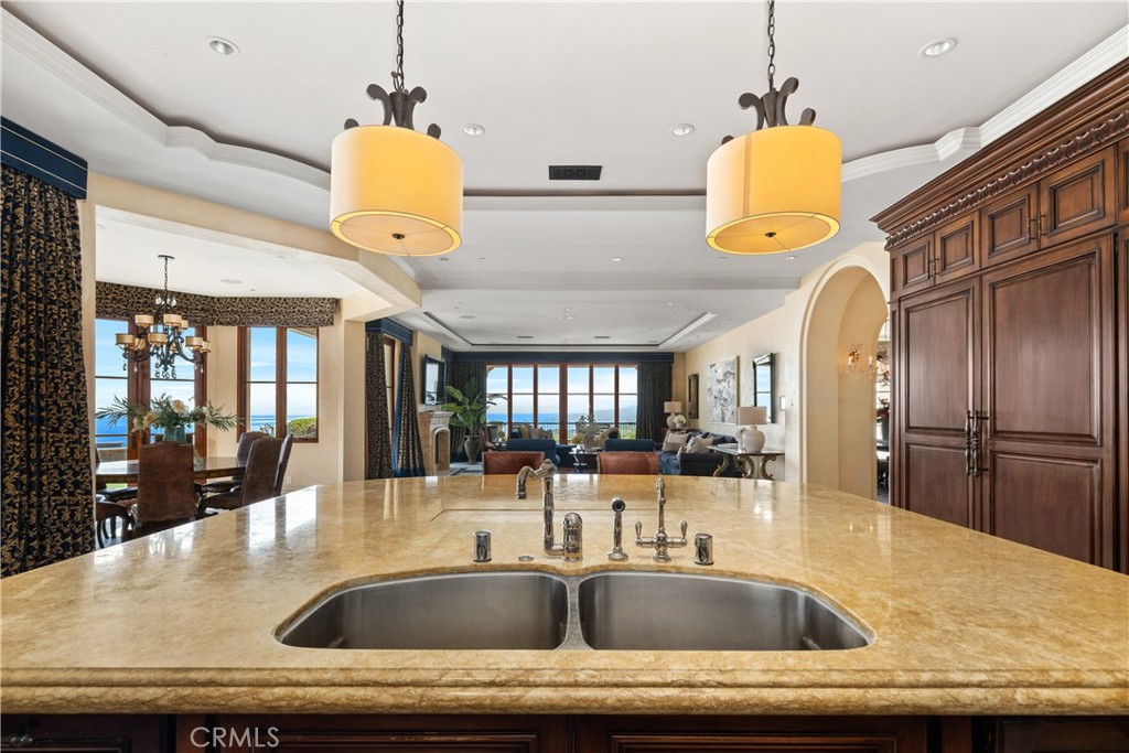 32040 Cape Point Drive Rancho Palos Verdes, CA 90275 - Photo 33 of 70 a kitchen with a sink a counter space and stainless steel appliances