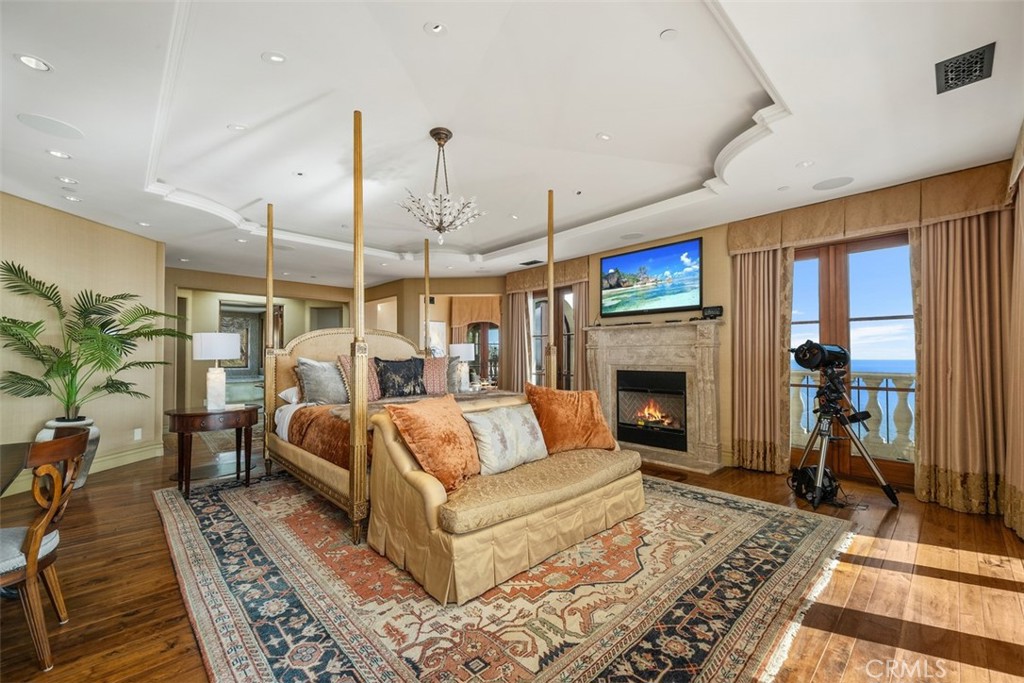 32040 Cape Point Drive Rancho Palos Verdes, CA 90275 - Photo 43 of 70 a living room with furniture a fireplace and a rug