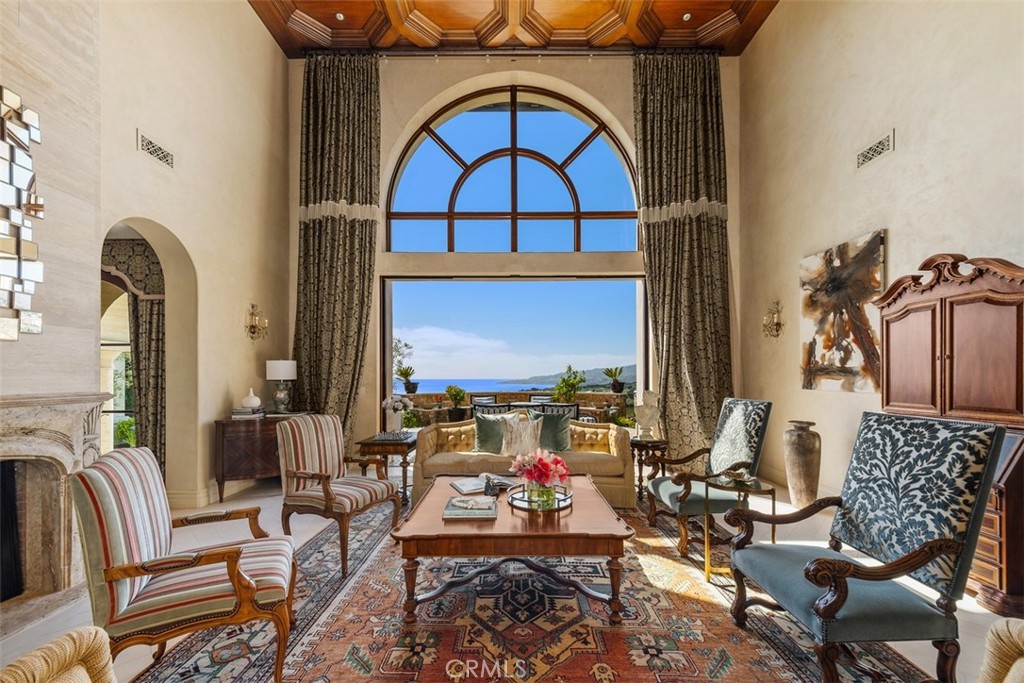 32040 Cape Point Drive Rancho Palos Verdes, CA 90275 - Photo 57 of 70 a living room with furniture and a fireplace