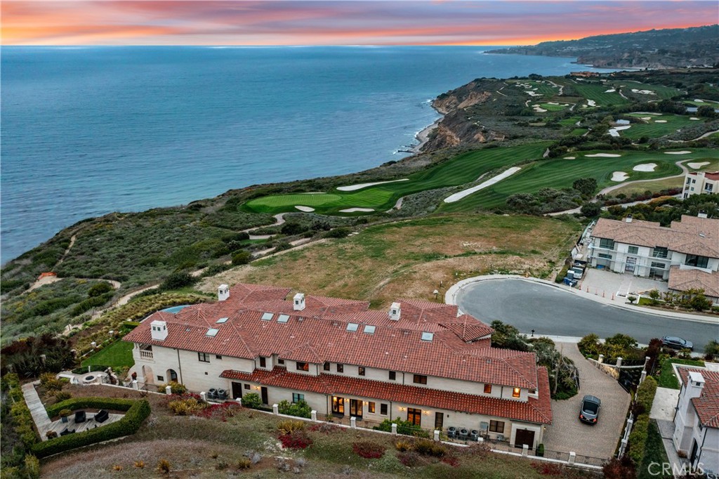 32040 Cape Point Drive Rancho Palos Verdes, CA 90275 - Photo 66 of 70 a view of a lake with a building in the background