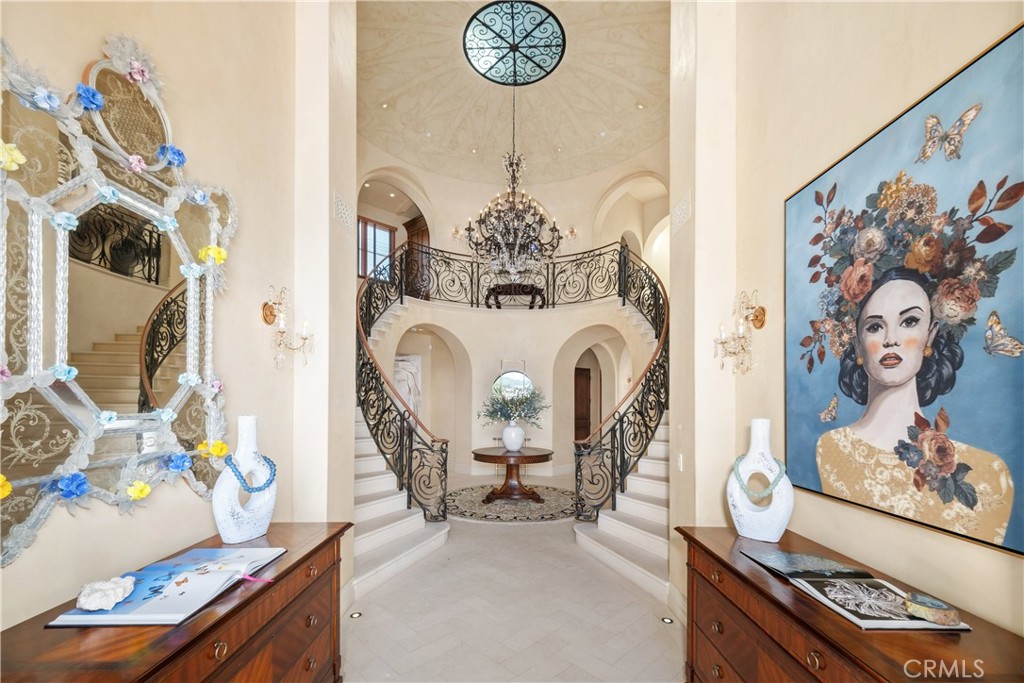 32040 Cape Point Drive Rancho Palos Verdes, CA 90275 - Photo 10 of 70 a view of a dining room with furniture and a chandelier