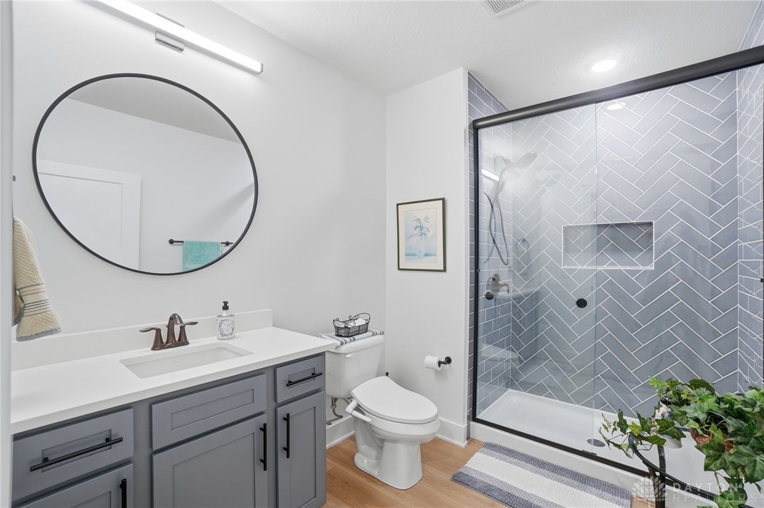 1247 Normandy Rue Dayton, OH 45458 - Photo 53 of 76 This modern bathroom features clean lines and a spacious shower.