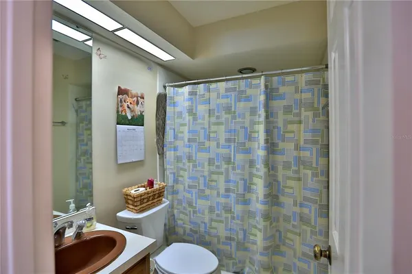 a bathroom with a toilet and sink