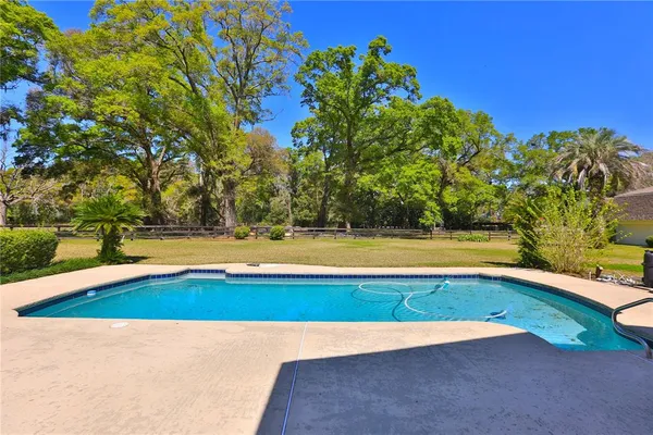 a view of swimming pool with outdoor space